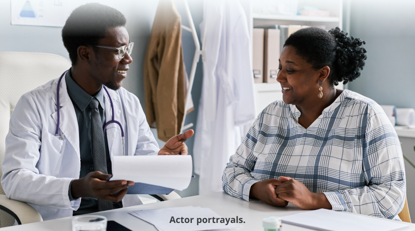 A doctor discusses treatment options with a patient