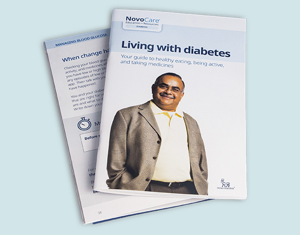 Covers of the Cornerstones4Care® Living with Diabetes and Checking Your Blood Sugar brochures, part of the Novo Nordisk assortment of diabetes education for newly diagnosed patients