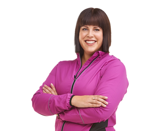 Woman standing with her arms crossed and smiling