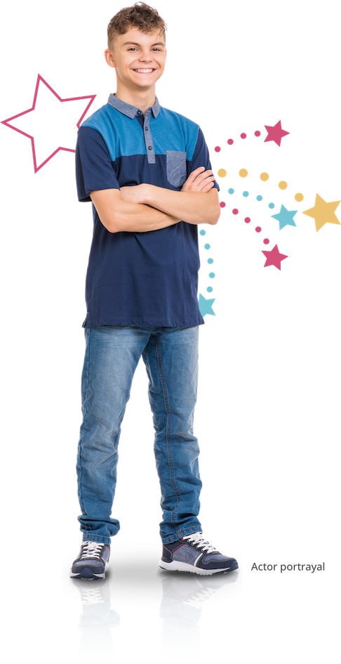 Boy standing with arms crossed