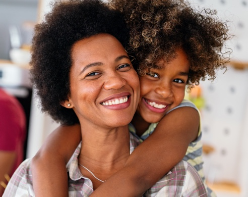 Daughter hugging her mother