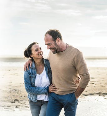 Couple walking on beach