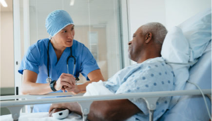HCP talking with patient in the hospital