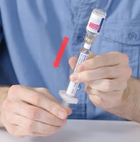 Person extracting the NovoSeven® RT medication from vial