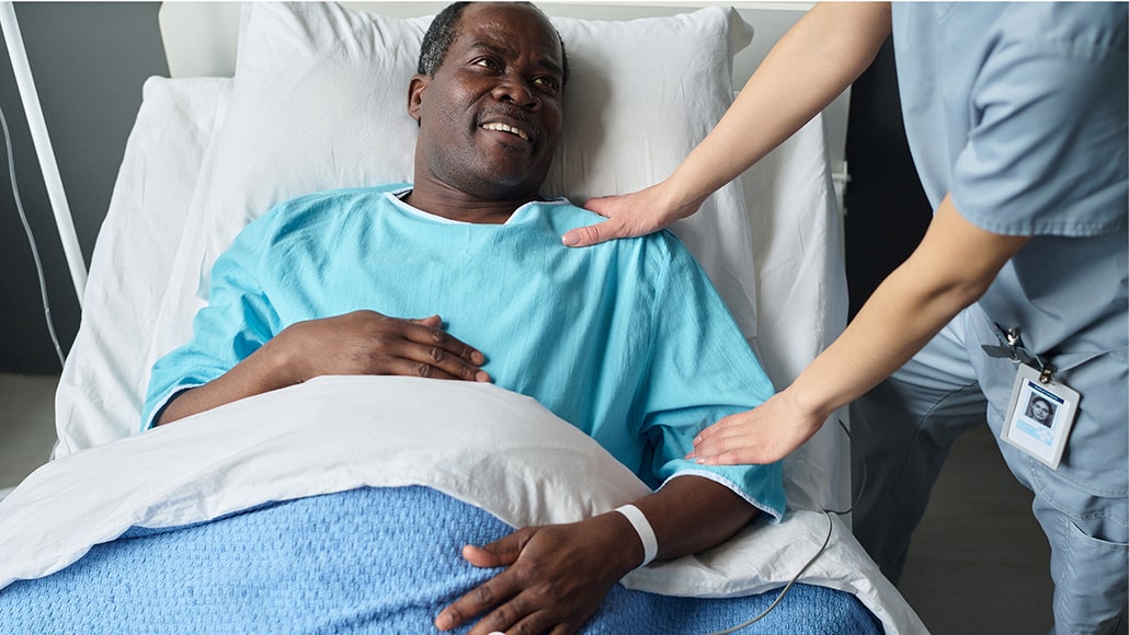 HCP talking with patient in the hospital