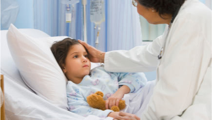 Doctor comforting child patient